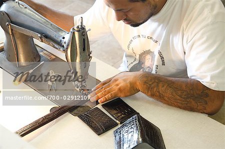 Man Sewing Leather Goods, Maida's Black Jack Boot Company, Houston, Texas, USA