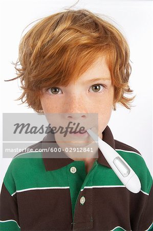 Boy With a Thermometer in His Mouth