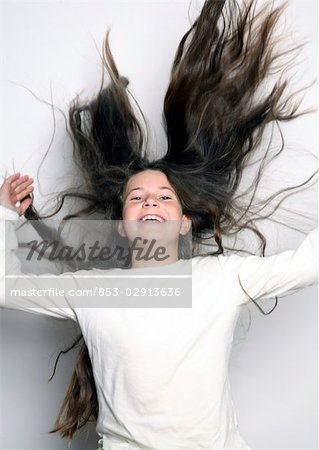Laughing girl with long dark hair