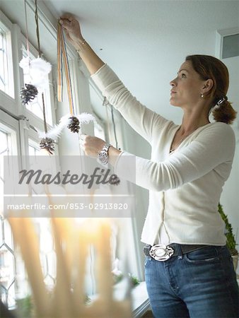 Woman decorating window