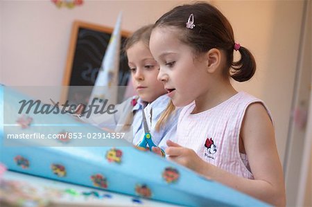 Two girls doing crafts