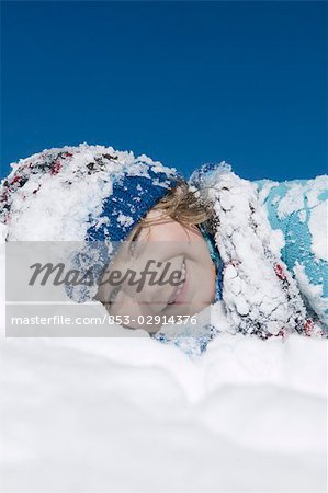 child playing in snow