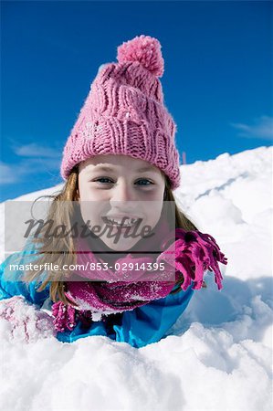 child playing in snow