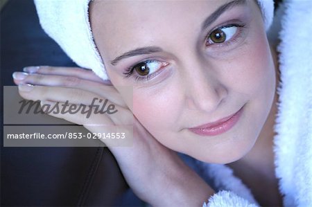 woman with a towel on her head, portrait