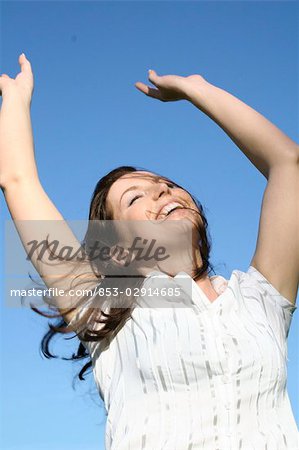 long-haired woman smiling, portrait