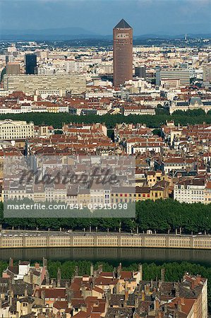 Low aerial view from Basilique Notre Dame de Fourviere over houses, tower blocks and commercial buildings of Lyon, the Rhone Valley, Rhone Alpes, France, Europe Low aerial view from Basilique Notre Dame de Fourviere over houses, tower blocks and commercial buildings of Lyon, the Rhone Valley, Rhone Alpes, France, Europe