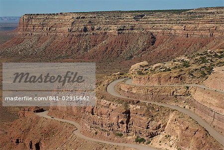 The Mokee Dugway road descends from Cedar Mesa, in the Valley of the Gods, Utah, United States of America, North America