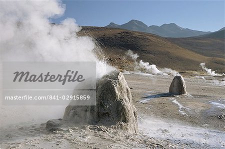 Active geysers on geyserite domes, El Tatio geyser basin on altiplano, Atacama Desert, Chile, South America Active geysers on geyserite domes, El Tatio geyser basin on altiplano, Atacama Desert, Chile, South America