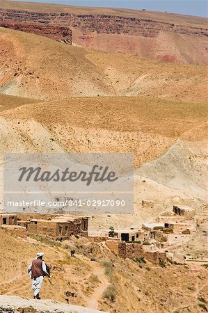 Man walking down mountain road, between Herat and Maimana, after Subzak Pass, Afghanistan, Asia