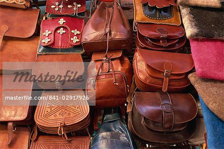 Leather goods on sale in souks, Medina, Marrakech, Morocco, North Africa, Africa