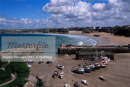 Harbour at low tide with town beach beyond, Newquay, Cornwall, England, United Kingdom, Europe