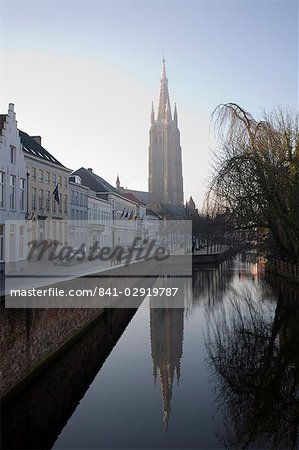 Looking south west along Dijver, towards The Church of Our Lady (Onze Lieve Vrouwekerk), Bruges, Belgium, Europe