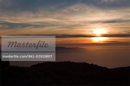 Sunset from Parque Nacional de Las Canadas del Teide (Teide National Park), looking south west to La Gomera, Tenerife, Canary Islands, Spain, Atlantic, Europe