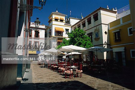 Outdoor restaurant in the Plaza de los Venerables, Santa Cruz district, Seville, Andalucia (Andalusia), Spain, Europe