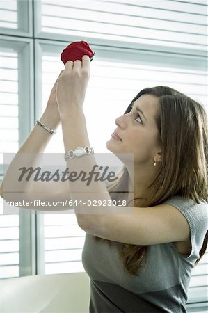 Professional woman looking at empty purse