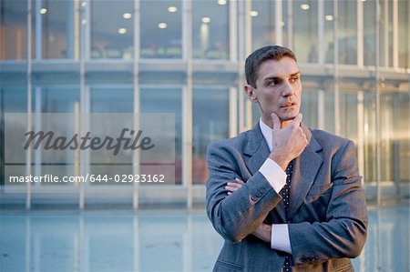 Businessman outside of office building