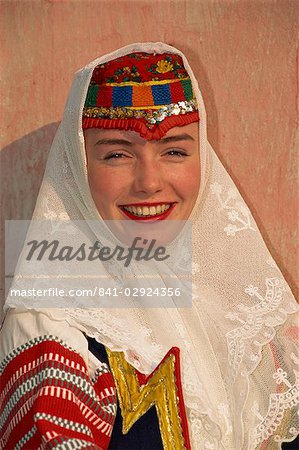 Portrait of a woman in traditional folk costume at Kezmarok, Slovakia, Europe