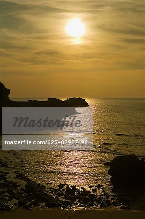 Silhouette of rocks in the ocean, Baie de Biarritz, Biarritz, France