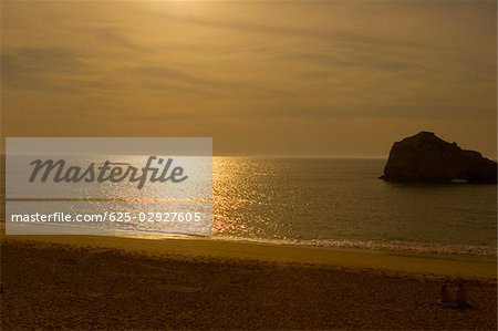 Silhouette of rock formation in the sea at dusk, Biarritz, Basque Country, Pyrenees-Atlantiques, Aquitaine, France