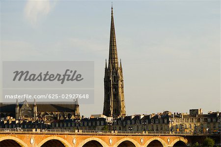 Arch bridge over a river, Pont De Pierre, St. Michel Basilica, Garonne River, Bordeaux, Aquitaine, France