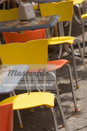 Tables and chairs at a sidewalk cafe, Sorrento, Sorrentine Peninsula, Naples Province, Campania, Italy
