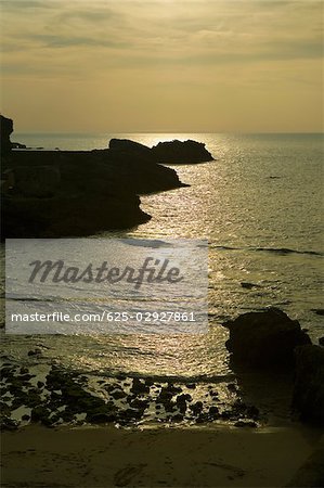 Silhouette of rocks in the ocean, Baie de Biarritz, Biarritz, France