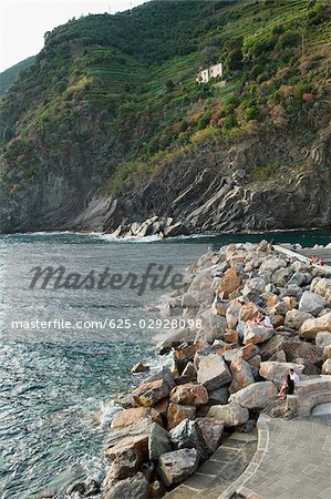 Stones at a riverside, Italian Riviera, Cinque Terre National Park, Vernazza, La Spezia, Liguria, Italy