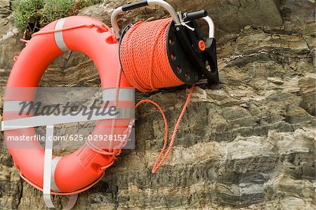 Life belt hanging on cliff, Cinque Terre National Park, RioMaggiore, Cinque Terre, La Spezia, Liguria, Italy