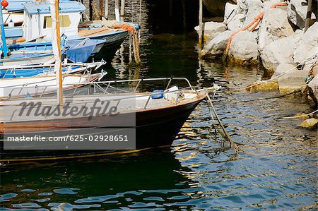 Boats docked at a harbor, Costiera Amalfitana, Amalfi, Salerno, Campania, Italy