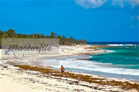 Tourist on the beach, Tulum, Quintan Roo, Mexico