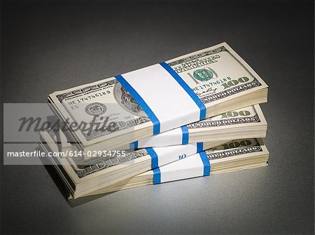 Stack of one hundred dollar bills