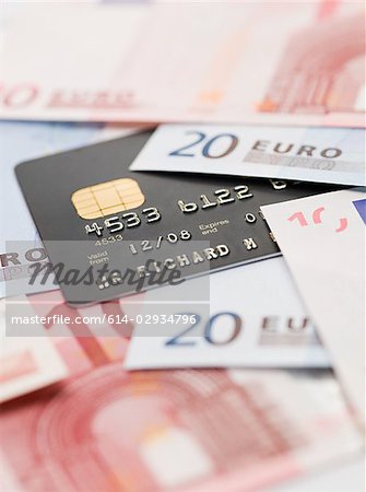 Credit card and euro banknotes