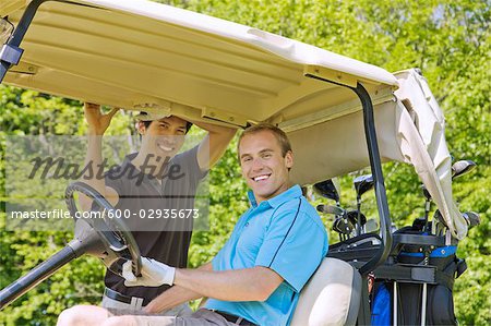 Men in Golf Cart