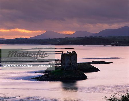 Castle Stalker on Loch Linnhe, silhouetted at dusk, Argyll, Scotland, United Kingdom, Europe