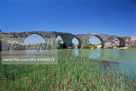 Arches of the Seljuk bridge over the Eurymedon River near Aspendos in the Antalya area of Anatolia, Turkey, Asia Minor, Eurasia