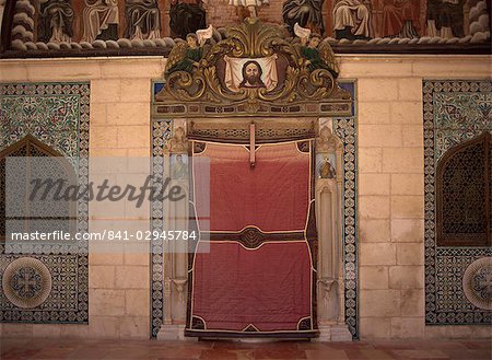 Close-up of entrance door covered with a blanket at the Armenian Church of St. James, in the Old City, Jerusalem, Israel, Middle East