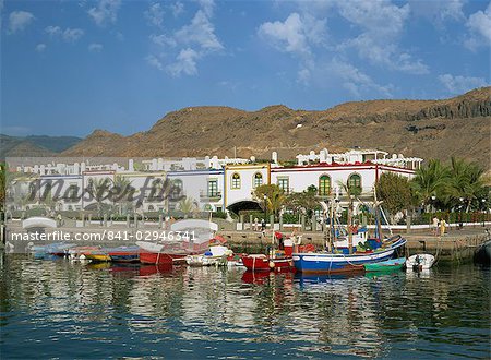 Colourful fishing boats and cottages in the old port area, Puerto de Morgan, Gran Canaria, Canary Islands, Spain, Atlantic, Europe