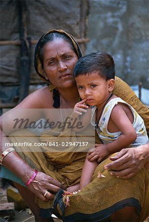 Mother and son in a slum in Dhaka, Bangladesh, Asia