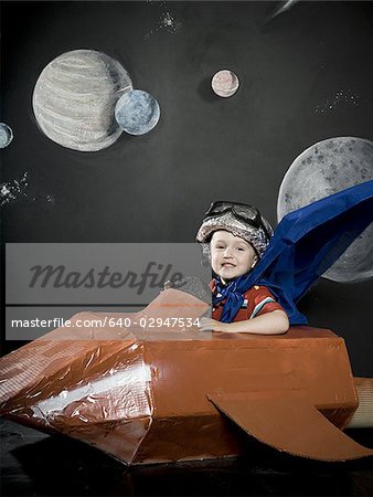 little boy in a rocketship
