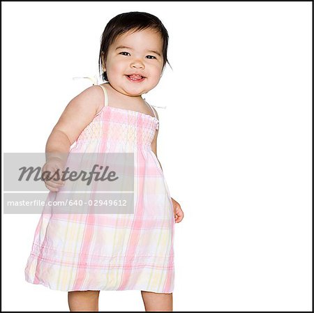 baby girl in a pink dress
