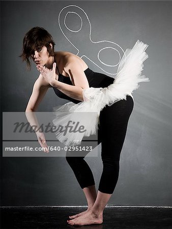 ballerina against a blackboard