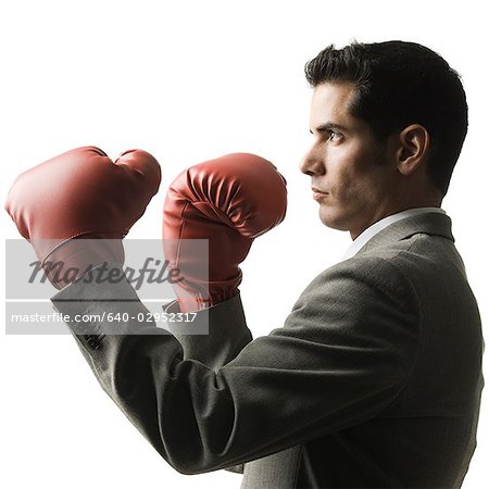 Businessman wearing Boxhandschuhe