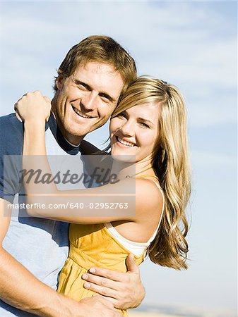 young couple on the side of the road