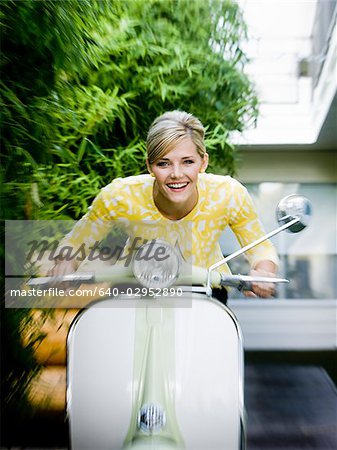 woman on a classic scooter