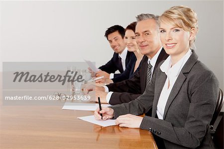 Four businesspeople in conference room, Bavaria, Germany
