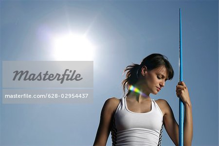 Woman holding a javelin