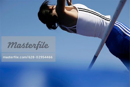 Woman high jumping