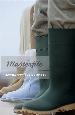 Three Pair of Legs with Rubber- and Winterboots - Clothing - Season