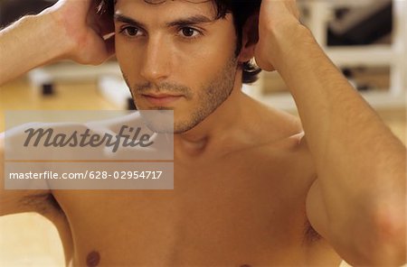 Darkhaired Man doing Sit-Ups - Physicalness - Sportiness