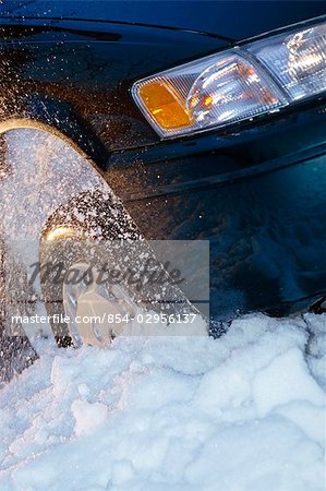 Vehicle Tire Stuck in Ditch Spinning Snow Winter SC AK